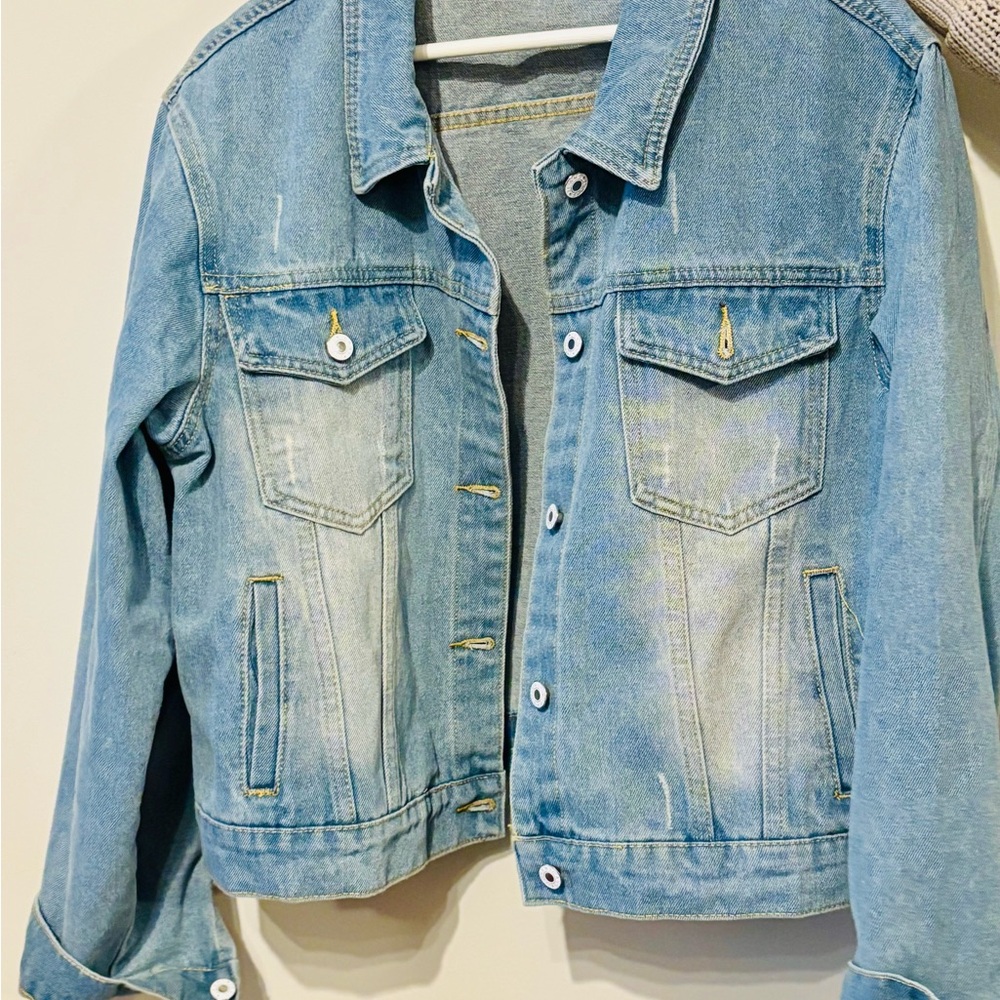 Light blue denim jacket – never worn